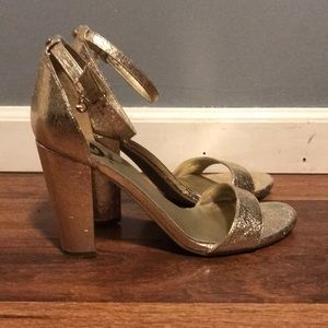 Gold high heels